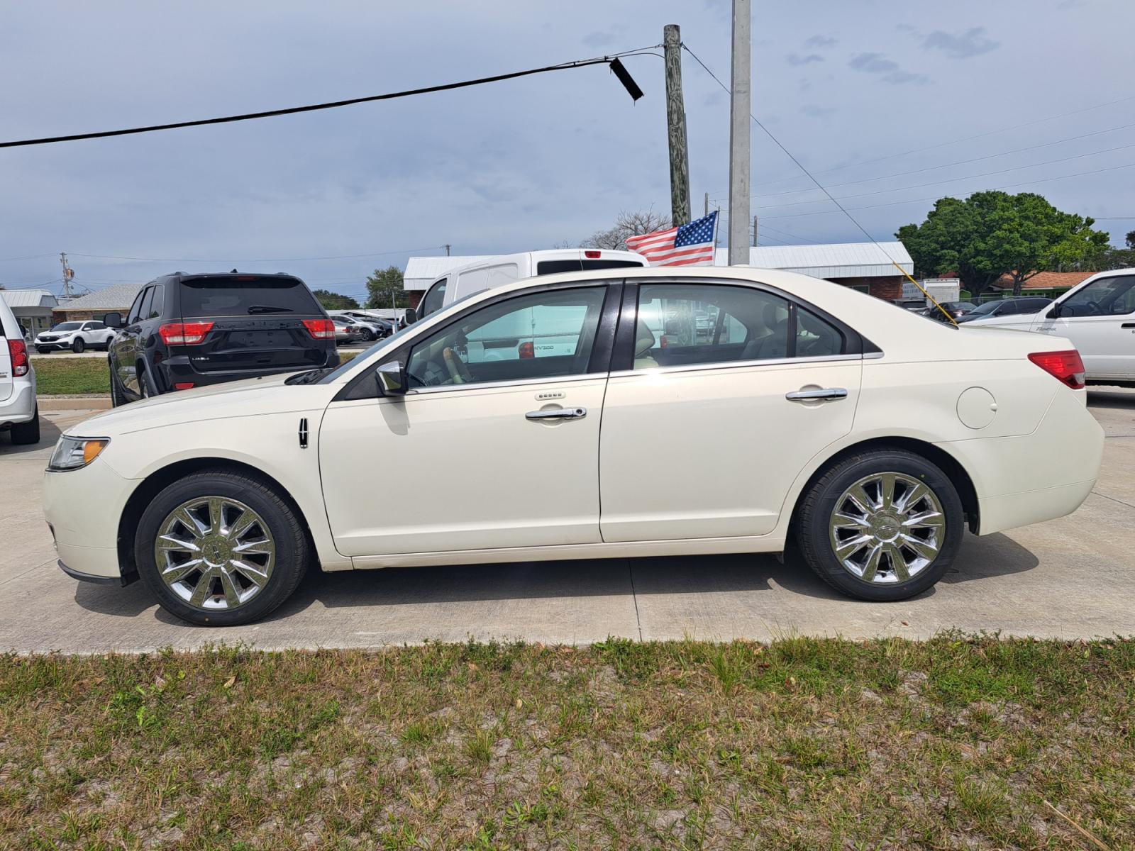 2012 White Lincoln MKZ AWD (3LNHL2JC5CR) with an 3.5L V6 DOHC 24V engine, 6-Speed Automatic transmission, located at 1181 Aurora Rd, Melbourne, FL, 32935, (321) 241-1100, 28.132914, -80.639175 - Photo #0